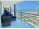 Spacious balcony with ample seating and breathtaking views of the ocean and beach at 9840 Queensway Blvd. # 1505, Myrtle Beach, SC 29572
