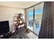 View from the living room showing the balcony with seating and an ocean view at 9840 Queensway Blvd. # 1505, Myrtle Beach, SC 29572