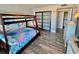 bedroom featuring a bunk bed with sliding closet doors at 9840 Queensway Blvd. # 1505, Myrtle Beach, SC 29572