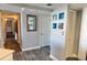 Hallway with tile flooring and blue art on the wall at 9840 Queensway Blvd. # 1505, Myrtle Beach, SC 29572