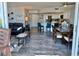 Open-concept living area that flows into the kitchen area at 9840 Queensway Blvd. # 1505, Myrtle Beach, SC 29572