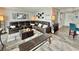 Comfortable living room featuring a large leather sectional and stylish decor at 9840 Queensway Blvd. # 1505, Myrtle Beach, SC 29572