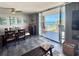 Comfortable living space featuring a dining area and access to a balcony with ocean views at 9840 Queensway Blvd. # 1505, Myrtle Beach, SC 29572