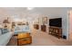 Inviting living room with comfortable seating, a neutral color palette, and an open floor plan at 1000 Ray Costin Way # 107, Garden City Beach, SC 29576