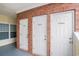 Outdoor storage area showcasing three brick-partitioned storage units, providing additional space at 1000 Ray Costin Way # 107, Garden City Beach, SC 29576