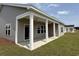 The exterior includes a covered back porch with white pillars at 1029 Jase Dr., Longs, SC 29568