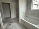 Relaxing bathroom featuring a soaking tub and separate shower, designed for comfort and convenience in your own home at 1029 Jase Dr., Longs, SC 29568