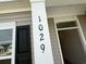 Close-up of the home's address with a window and black shutter at 1029 Jase Dr., Longs, SC 29568