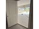 Garage opening revealing a residential street with new homes, and a basketball hoop at 1029 Jase Dr., Longs, SC 29568
