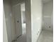 Hallway featuring ample space and access to the home's interior rooms, showcasing the easy navigation between areas at 1029 Jase Dr., Longs, SC 29568