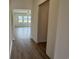 Hallway with luxury vinyl plank flooring leading to the living room at 1029 Jase Dr., Longs, SC 29568