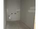 An unfinished laundry room ready for appliances at 1029 Jase Dr., Longs, SC 29568