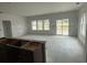 Open floor plan living room featuring sliding glass doors leading to the backyard, creating an indoor-outdoor living experience at 1029 Jase Dr., Longs, SC 29568