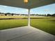 View of the back porch and spacious backyard at 1033 Jase Dr., Longs, SC 29568