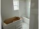Bathroom featuring a bathtub and vanity, awaiting the finishing touches at 1033 Jase Dr., Longs, SC 29568