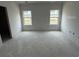 Spacious bedroom with two windows, perfect for natural light and comfortable living at 1033 Jase Dr., Longs, SC 29568