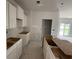 Unfinished kitchen with blank white cabinets, offering a blank slate for a modern design at 1033 Jase Dr., Longs, SC 29568