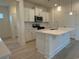 Kitchen with white cabinets, stainless steel appliances, and a center island at 1033 Jase Dr., Longs, SC 29568