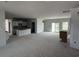 Unfinished open-concept living and kitchen area, providing a flexible space for entertaining and living at 1033 Jase Dr., Longs, SC 29568