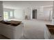 Spacious, unfinished living area with ample natural light, ready to become a personalized space at 1033 Jase Dr., Longs, SC 29568