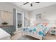 Coastal-themed bedroom with colorful bedding, nautical decor, and plenty of natural light at 1035 Brentford Pl., Myrtle Beach, SC 29579