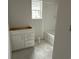 Bathroom featuring a new vanity, tub, and tile surround at 1037 Jase Dr., Longs, SC 29568