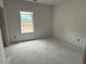 Spacious bedroom featuring a large window allowing for ample natural light at 1037 Jase Dr., Longs, SC 29568
