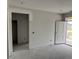 Hallway to the front door with visible electrical outlets, ready for finishing touches at 1037 Jase Dr., Longs, SC 29568