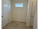 Bright hallway with white trim and doors and durable, modern flooring at 1037 Jase Dr., Longs, SC 29568
