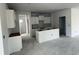 Open kitchen with white cabinets, an island, and space for modern appliances and countertops at 1037 Jase Dr., Longs, SC 29568