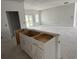 Spacious open area with an island, ready for modern appliances and finishing touches at 1037 Jase Dr., Longs, SC 29568