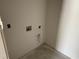 Utility room with visible water and electrical hookups, ready for washer and dryer installation at 1037 Jase Dr., Longs, SC 29568