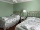 Comfortable bedroom featuring bright walls, natural light, and two twin beds at 112 B 12Th Ave. N, Surfside Beach, SC 29575