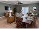 Comfortable living room featuring dining area, ceiling fan and plenty of light at 112 B 12Th Ave. N, Surfside Beach, SC 29575