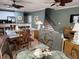 Open floor plan featuring bar seating, dining table, and comfortable living space at 112 B 12Th Ave. N, Surfside Beach, SC 29575