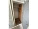 Storage closet with shelving and wooden floor inside a building at 116 S Waccamaw Dr. # 205, Murrells Inlet, SC 29576
