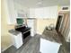 Well-equipped kitchen with granite countertops and modern appliances at 116 S Waccamaw Dr. # 205, Murrells Inlet, SC 29576