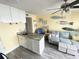 Combination kitchen and living area featuring stylish decor and beach views at 116 S Waccamaw Dr. # 205, Murrells Inlet, SC 29576