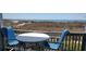 Enjoy ocean views from the cozy balcony with outdoor seating at 1311 S Ocean Blvd. # B-1, North Myrtle Beach, SC 29582