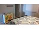 Bright, nautical-themed bedroom with a decorative dresser and cozy bedding at 1311 S Ocean Blvd. # B-1, North Myrtle Beach, SC 29582