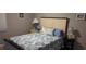 This well-lit bedroom features nautical themed decor and comfortable bedding at 1311 S Ocean Blvd. # B-1, North Myrtle Beach, SC 29582