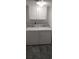 Laundry room with washer and dryer and white cabinets for storage at 1311 S Ocean Blvd. # B-1, North Myrtle Beach, SC 29582