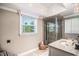 Modern bathroom featuring a glass shower, stone accents, and great natural light at 134 Mohican Dr., Georgetown, SC 29440