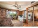 Cozy bedroom with wood paneling and a mirrored closet at 134 Mohican Dr., Georgetown, SC 29440