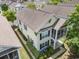 Aerial perspective of a home with a screened-in porch, surrounded by lush greenery at 1379 Cottage Dr., Myrtle Beach, SC 29577