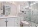 Bright bathroom with a glass-enclosed shower, white vanity, and modern fixtures at 1379 Cottage Dr., Myrtle Beach, SC 29577