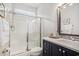 Comfortable bathroom features a shower, mirror, and double vanity at 1379 Cottage Dr., Myrtle Beach, SC 29577