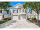 Charming two-story home boasts a two-car garage, well-maintained landscaping and a welcoming facade at 1379 Cottage Dr., Myrtle Beach, SC 29577