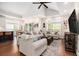 Open concept living room with high ceilings, lots of natural light, and hardwood floors at 1379 Cottage Dr., Myrtle Beach, SC 29577