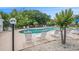 Relaxing community pool area with lounge chairs and well-maintained landscaping at 1379 Cottage Dr., Myrtle Beach, SC 29577